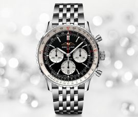 Breitling Navitimer stainless steel luxury chronograph watch with black dial and silver bezel