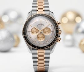 Two-tone Omega Speedmaster luxury watch with rose gold accents and chronograph display